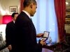 President Barack Obama looks at the Nobel Peace Prize medal at the Norwegian Nobel Institute in Oslo, Norway, Dec. 10, 2009. (Official White House Photo by Pete Souza)